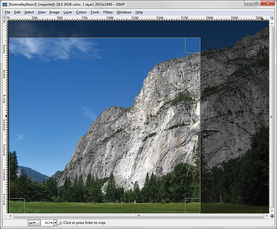 The work area window in the screenshot displays a scenic image. The bottom-left portion of the image that is to be displayed is selected. 